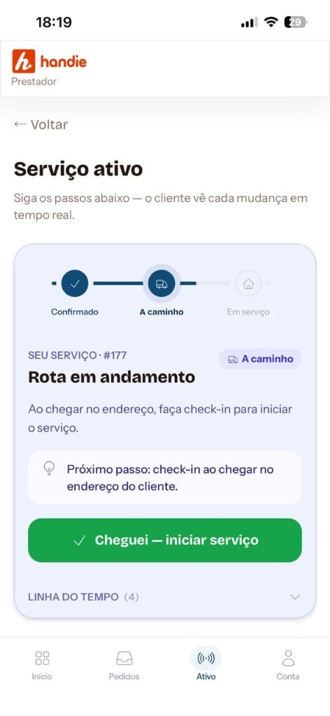 Tela do app Handie para prestador, com serviço ativo e rota em andamento